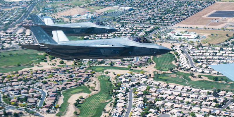 Luke, Arizona ANG salute Phoenix F-35A Lightning IIs piloted by Brig. Gen. Todd Canterbury, 56th Fighter Wing commander, and Col. Jim Greenwald, 944th FW commander, both assigned to Luke Air Force Base, fly in formation during the Air Force Salutes flyover May 1, 2020, over Arizona.The F-35s participated in a 15-aircraft formation including F-35s and F-16 Fightning Falcons from the 56th FW and 944th FWs, and a KC-135 from the 161st Air Refueling Wing as a Total Force salute to each American serving on the frontlines in the fight against Coronavirus Disease 2019. Air Force Salutes flyovers are a way for the U.S. Air Force to show appreciation to the thousands of heroes at the front line battling COVID-19. (U.S Air Force photo by Senior Airman Jacob Wongwai)