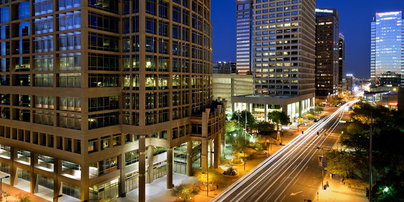 Long exposure photo of the a city street in downtown Phoenix, Arizona at night. Long exposure photo of the a city street in downtown Phoenix, Arizona at night.